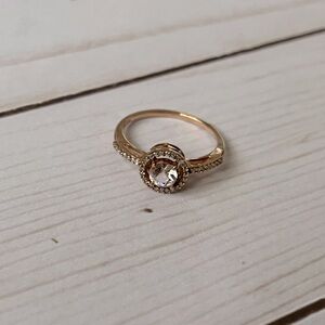 Gold tone and pale pink stone fashion ring